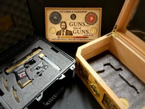 A hand gun and John Wick Collector's Box